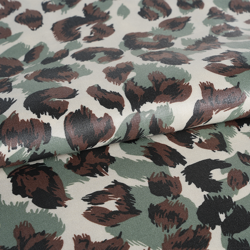 20D * 21S verdikte gouden katoenen stof met drie kleuren luipaardprint